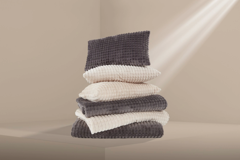 Sierkussens, plaids en bedspreien