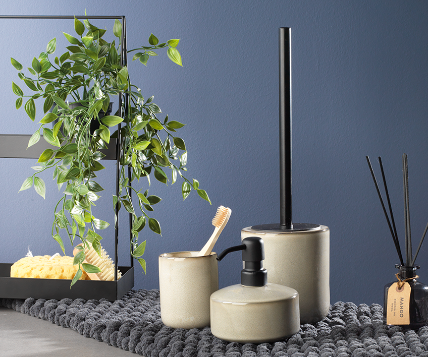 Faux plant shown as a part of bathroom décor ideas 