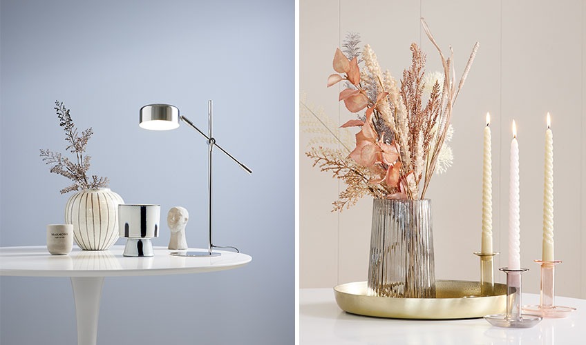 Vases, candle sticks, lamp and candle in Scandinavian design and light colours 